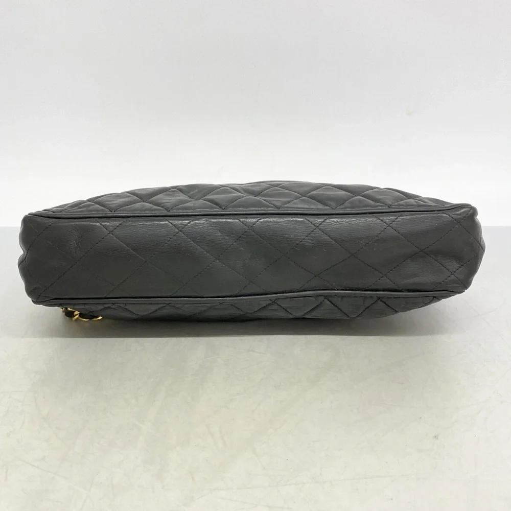 Authentic CHANEL black lambskin vintage charm shoulder bag
